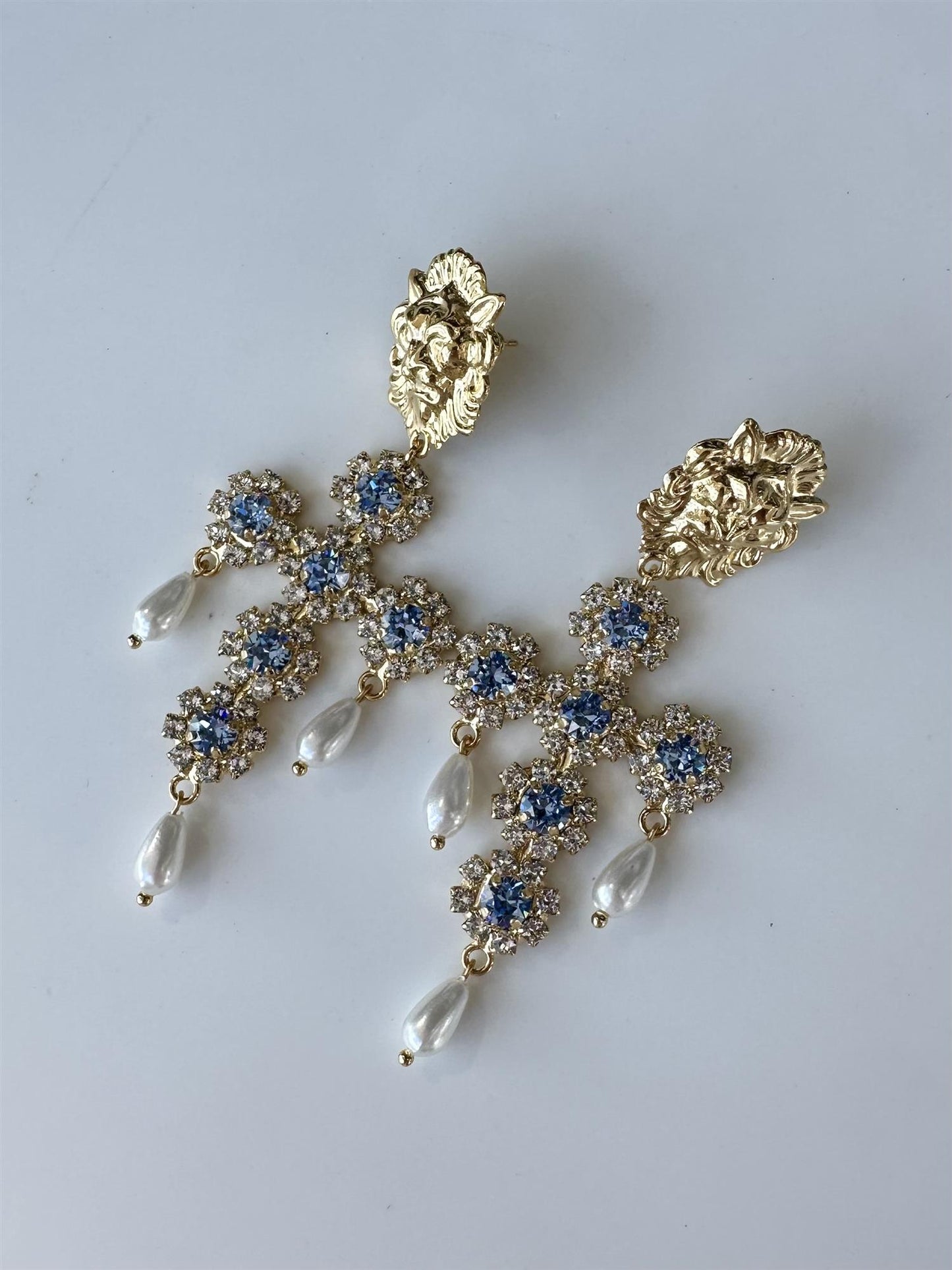 Petite Fleurs Cross - Light Sapphire