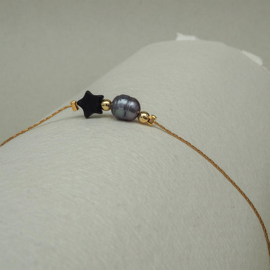 Dainty Noir Star Twist Bracelet